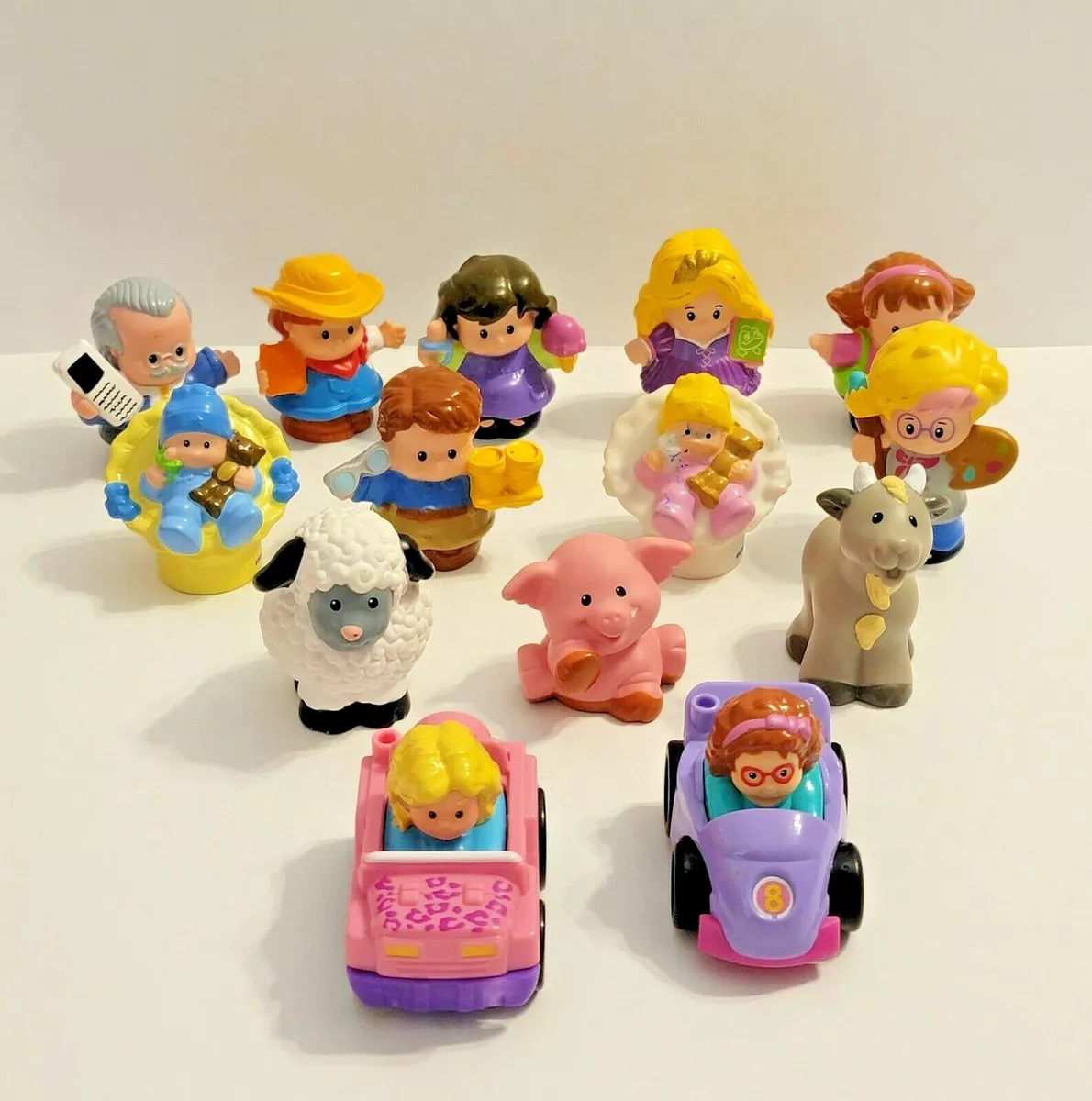 Muñecos little people sales
