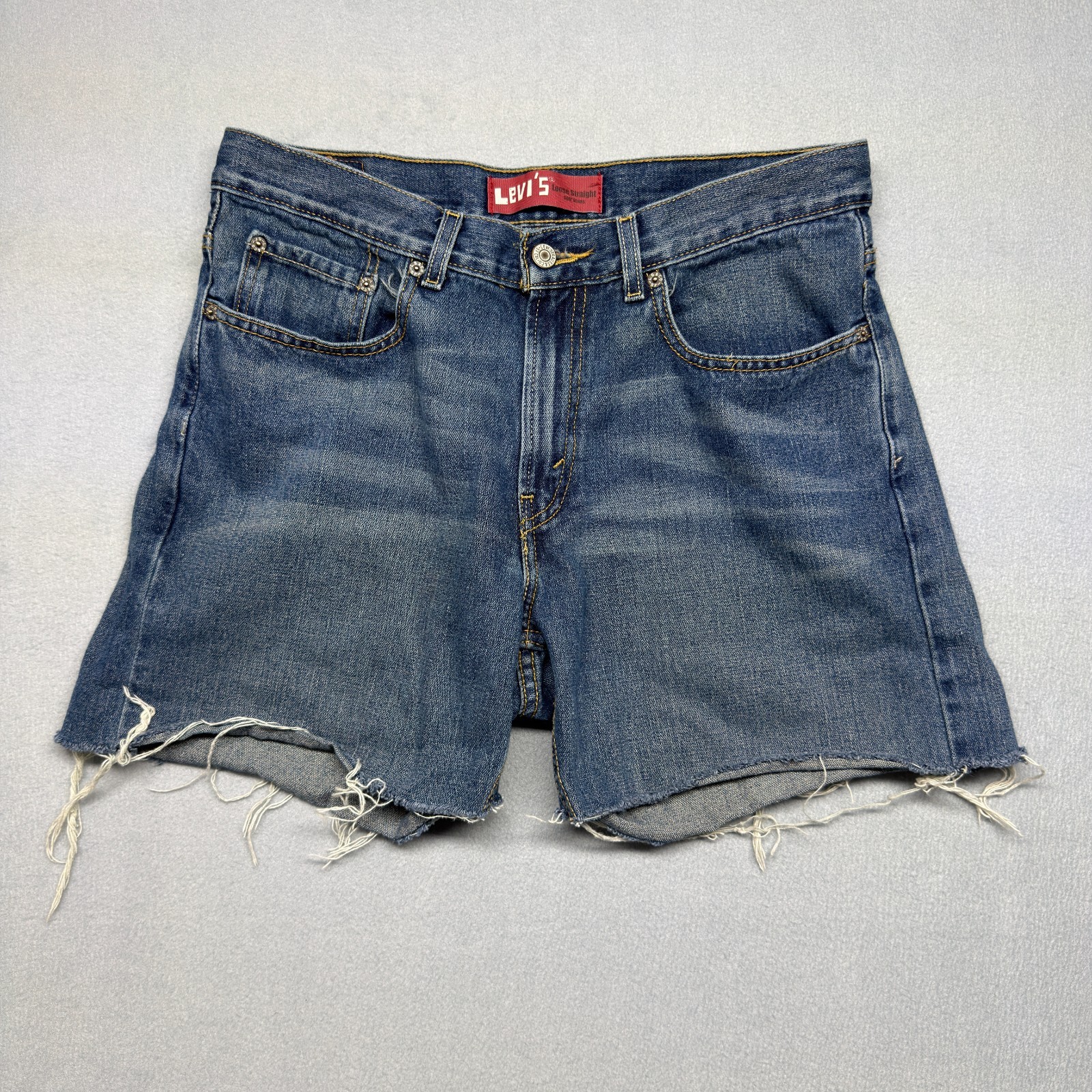 Levis Womens 12 32 Cutoff Denim Shorts Medium Wash Frayed Raw Hem