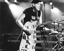 * RICK NIELSEN * signed 8x10 photo * CHEAP TRICK * COA *