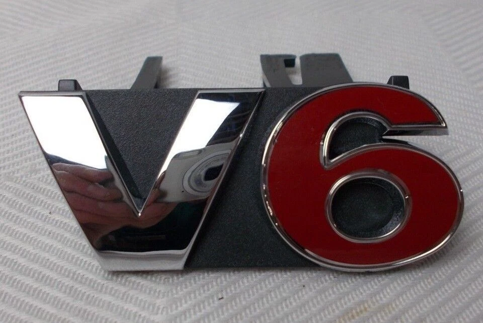 Se adapta a; emblema de parrilla Volkswagen Jetta "V-6" NOS 1J5 853 679 A GQF Foto 2 de 4
