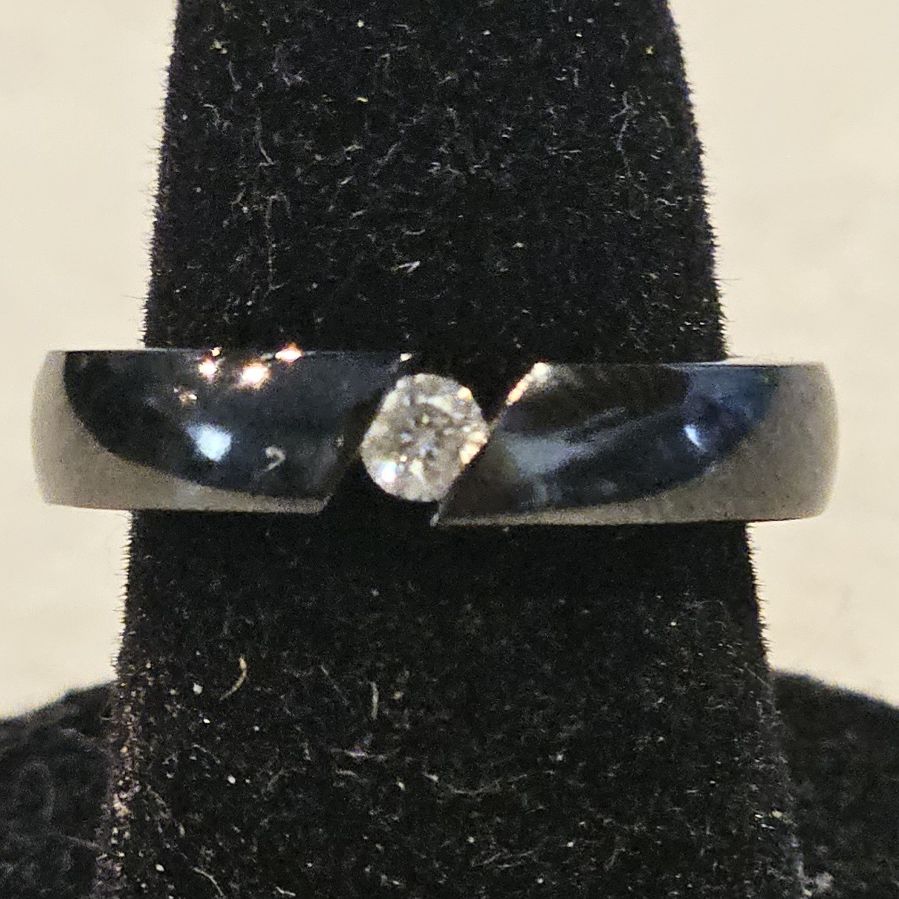 Black Titanium Ring With Round Stone Channel Set - image 1