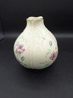 Cream LENOX MORNINGSIDE vase with gold rim, purple dragon and bee motifs, and green leaf accents on a dark background.