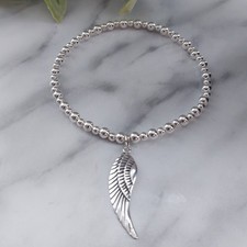 Sterling Silver Bead Elasticated Stretch Bracelet With Angel Wing Charm