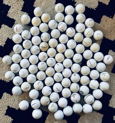100 Titleist golf balls 2A/shag including premium models. See photo.