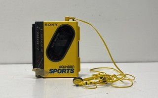 Sony Walkman Sports WM F75 Vintage AM/FM Cassette Player Yellow Auto Reverse