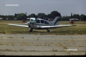 BELLANCA VIKING AIRCRAFT PARKED AT SMALL TOWN AIRFIELD, 1977 PHOTO SLIDE #2
