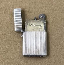 ancien briquet à essence Parisien FLAMIDOR 1911 ( vintage collection laiton )