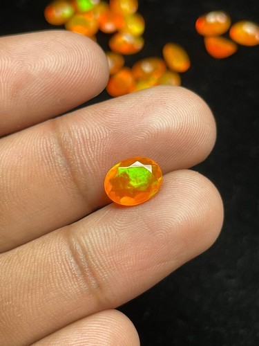 Beautiful Orange Ethiopian Opal , Green Fire Opal Faceted Oval Shape Cut , 9x7MM - Picture 2 of 4