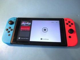 Nintendo Switch System Console w/Neon Red & Blue Joy-Cons + Dock & Extras