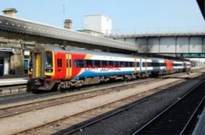 PHOTO  CLASS 158 DMU 158810 AND A CLASSMATE AWAIT DEPARTUE ON A SERVICE TO NOTTI