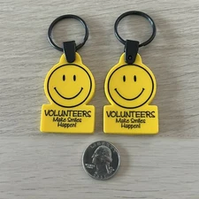 Lot of 2 Volunteers Make Smiles Happen Yellow Keychains Key Rings #43255