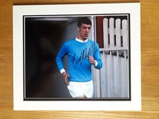 Tommy Booth, Manchester City. 12x10 Mounted Personally Signed Photo