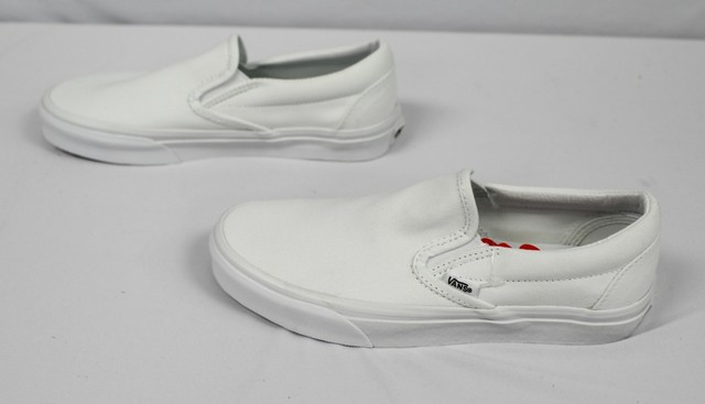 solid black slip on vans