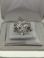 Vintage Heart Shaped Cubic Zirconia Surrounded by Radiant Baquettes Silver Ring