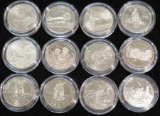 (12) DIFFERENT 50c COMMEMORATIVE BU / PROOF COINS IN CAPSULES