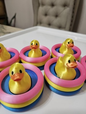 Lot of 9 Rubber Duckies Floats Clickers