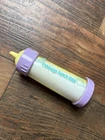 Cabbage Patch Kids Sipping Babies Bottle Orange Juice Purple Vintage