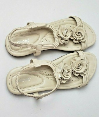 cream colored flat sandals