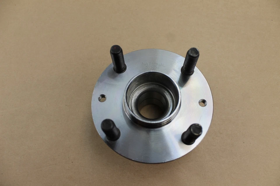 Cojinete/buje de rueda trasera de tambor NO ABS para 91-03 Ford Escort, 90-03 Mazda Protege Foto 2 de 4