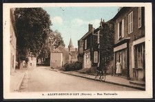 Old postcard Saint-Benin-d'Azy, Rue Nationale with bicycles and pedestrians 