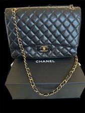 CHANEL Classic Double Flap Bag Quilted Caviar Black Jumbo