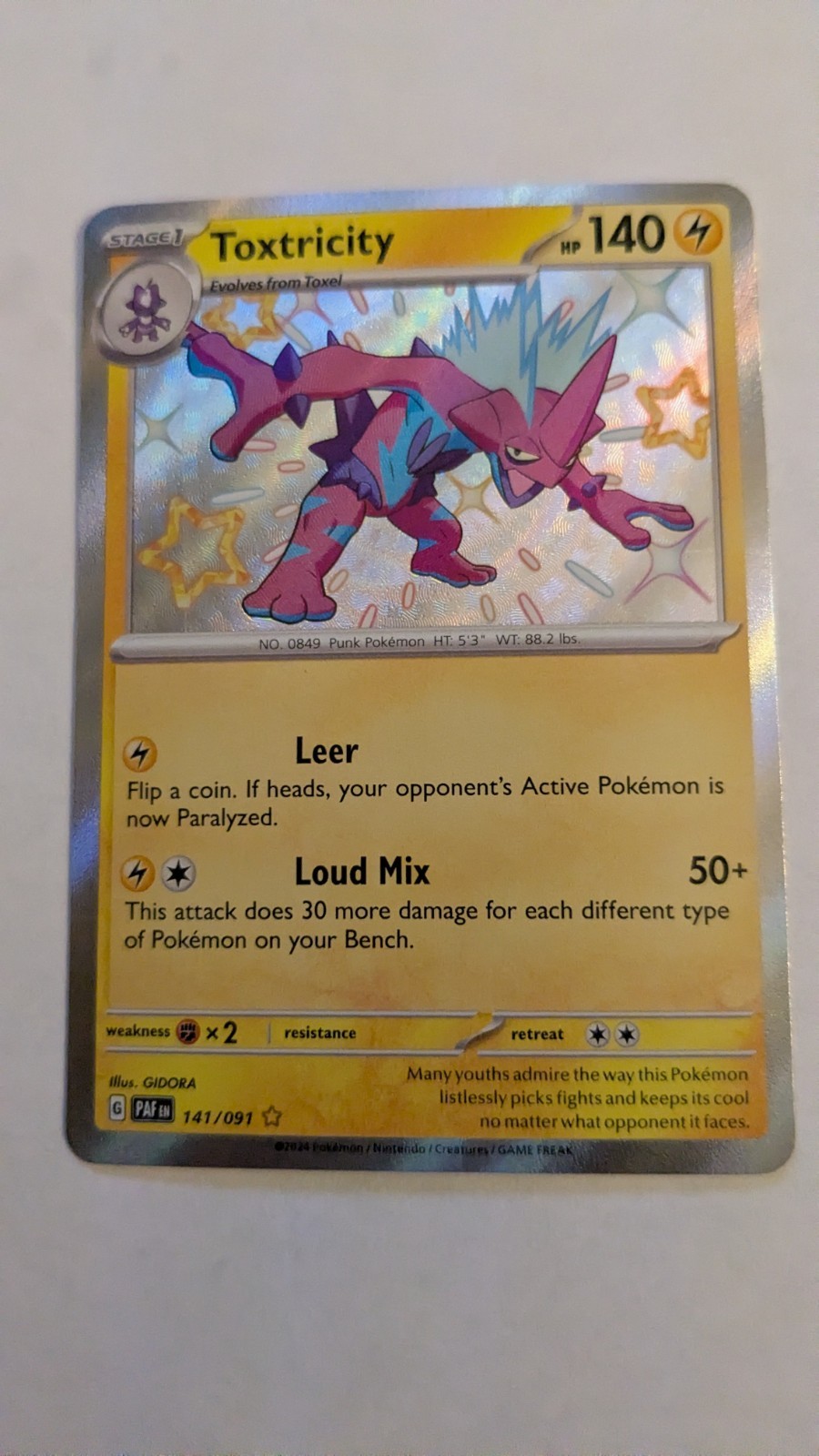 Toxtricity 141/091 SV: Paldean Fates Holo
