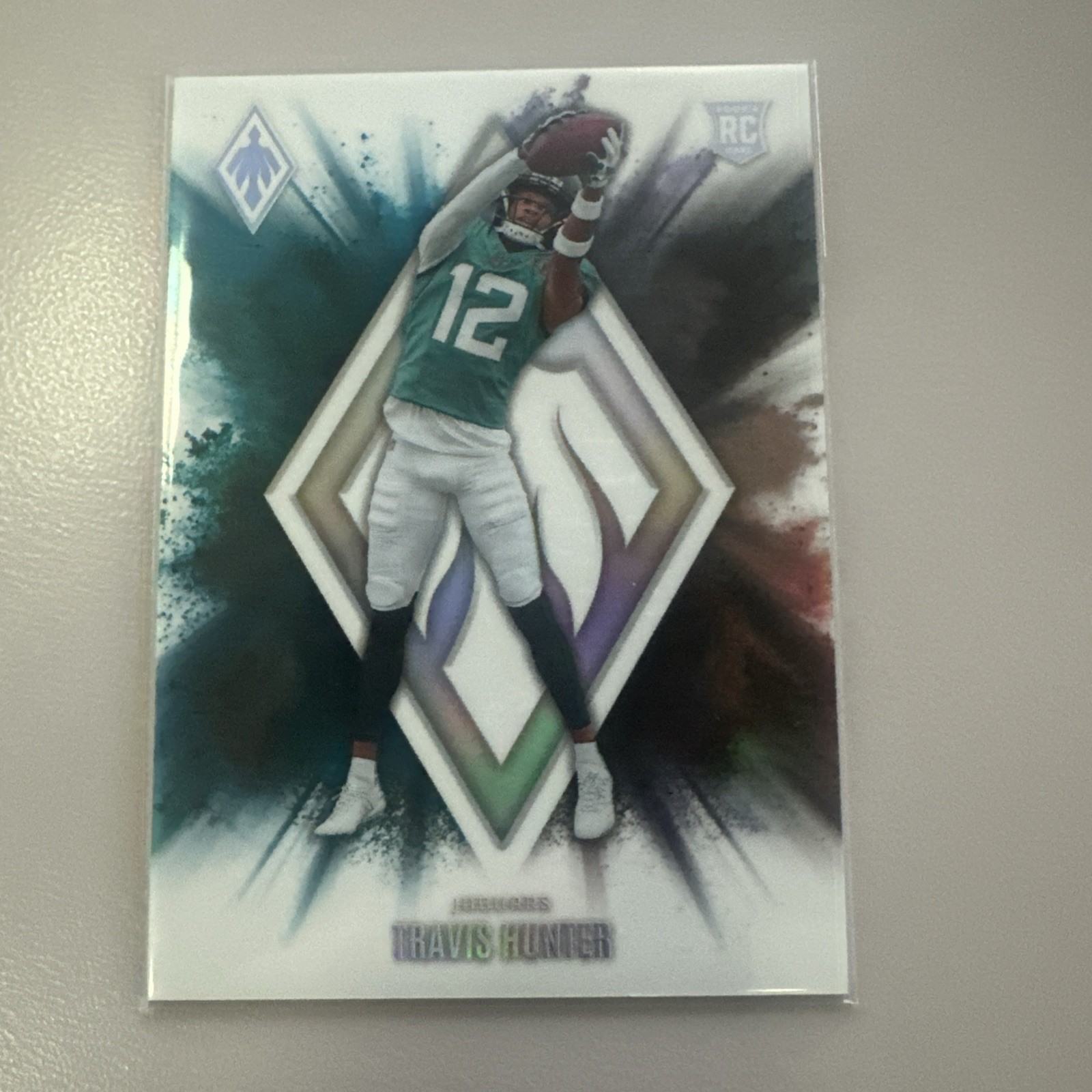 2025 Panini Phoenix - Color Blast Travis Hunter #7 (RC)