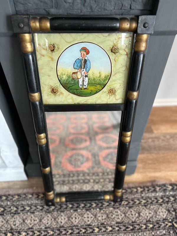 Federal-style mirror with reverse-painted glass panel depicting a musician