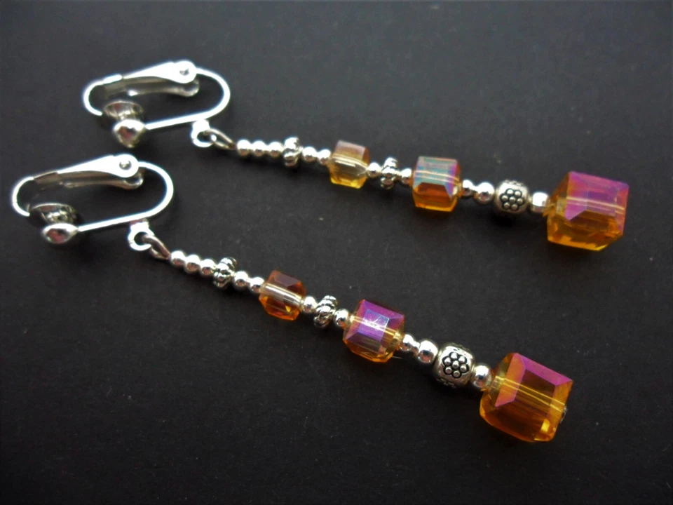 A PAIR SILVER PLATED AMBER CUBE BEAD LONG DANGLY CLIP ON EARRINGS. NEW. - Image 1 of 1