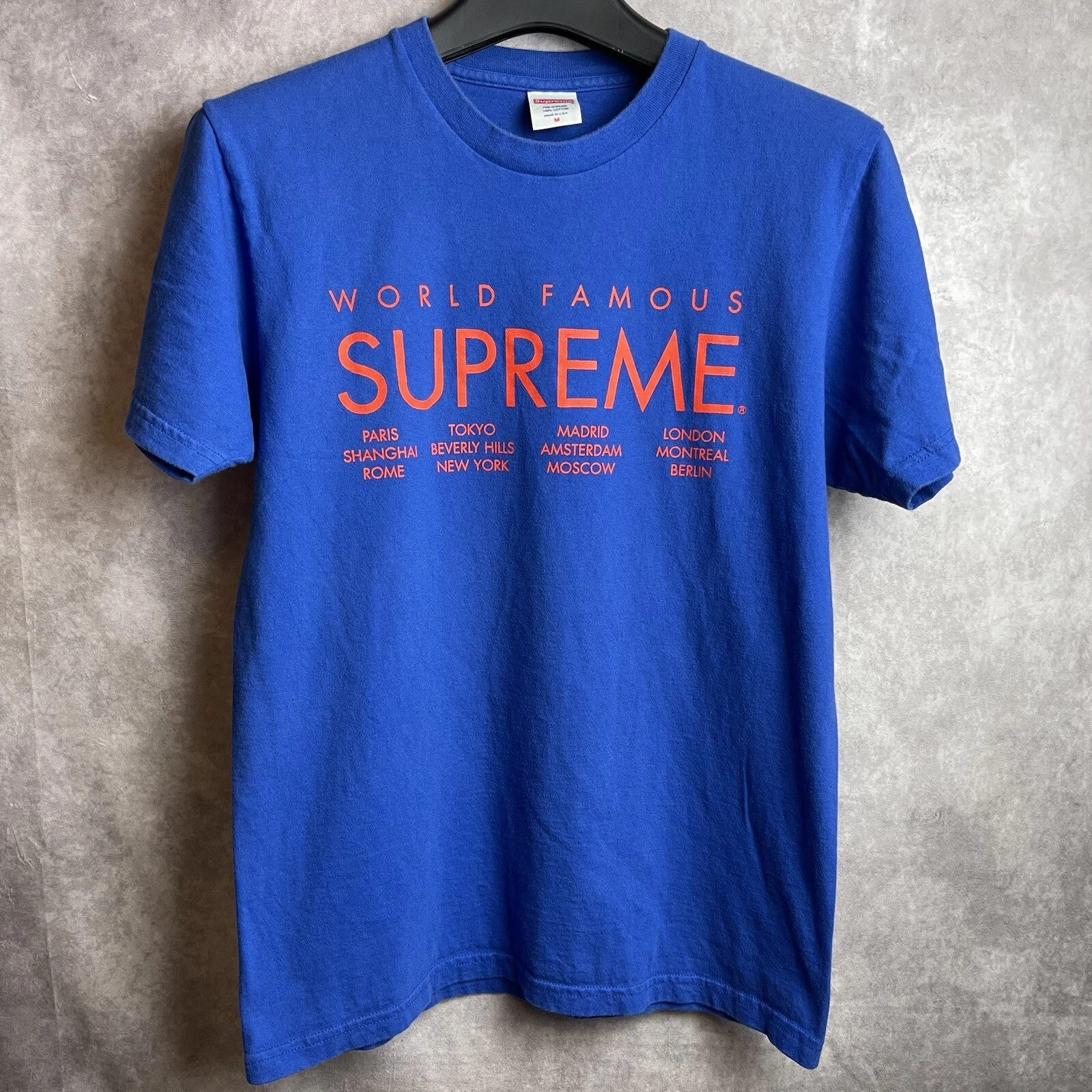 T shirt bleu orange Supreme International World Famous SS15 taille adulte moyenne M USA