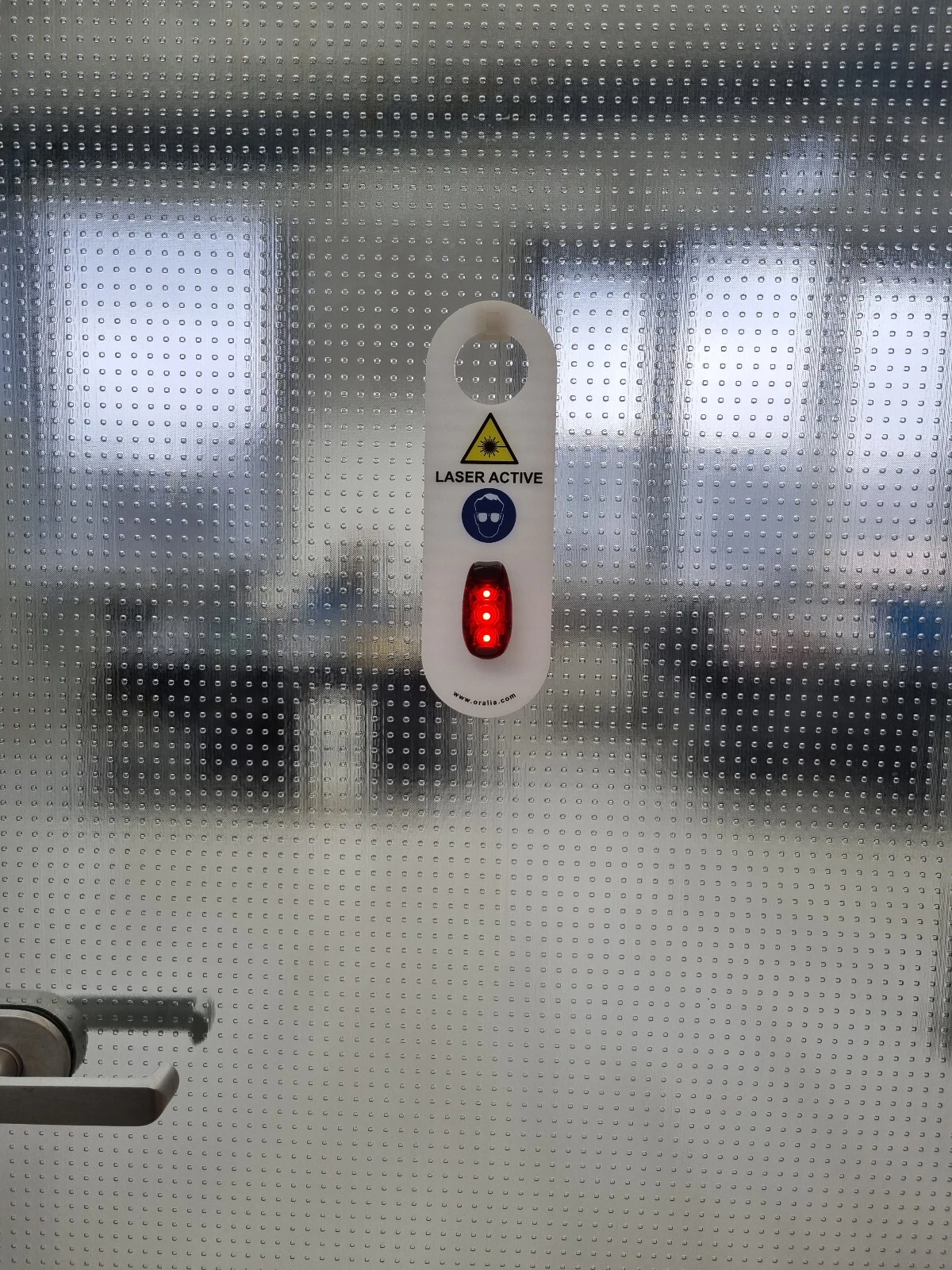 ORALIA Laserwarnleuchte an Klebesockel