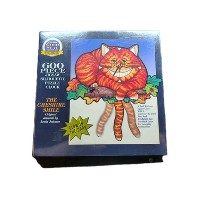 Bits & Pieces The Cheshire Smile Puzzle Clock Glow In The Dark NIB Sealed Rare 