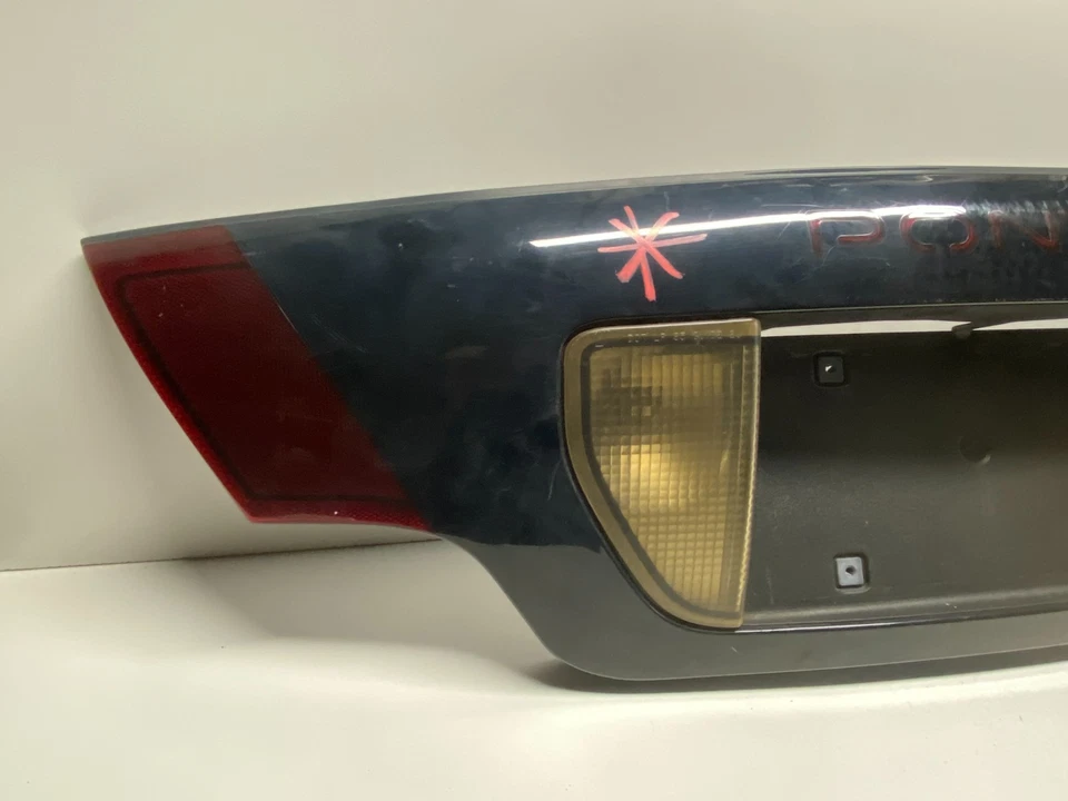 96 - 99 PONTIAC SUNFIRE CENTRO TRASERO 2 PUERTAS TAPA MONTADA LUZ TRASERA OEM, 16520138 Foto 3 de 4