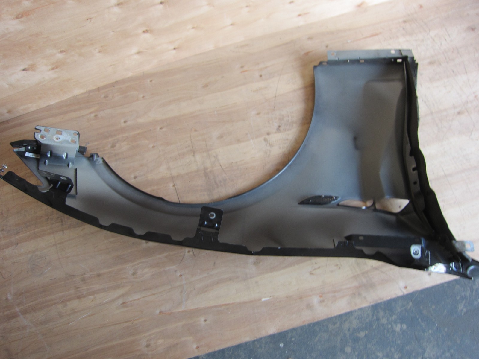 Maserati Ghibli 2014. LH Front Fender. Black. Part # 673002041