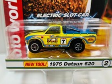 AUTO-WORLD X-TRACTION 1975 DATSUN 620 LOWE DIE CASTING NEW Aurora AFX