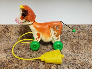 fisher price cow pull toy