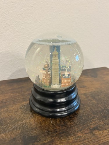 Saks Fifth Avenue musical snow globe featuring a city skyline, Boston city
