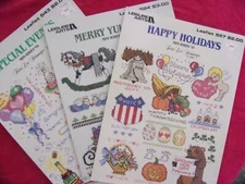 3  VTG 1980S  LEISURE ARTS CROSS STITCH LEAFLETS SEE DESCRIPTIONAND PHOTOS
