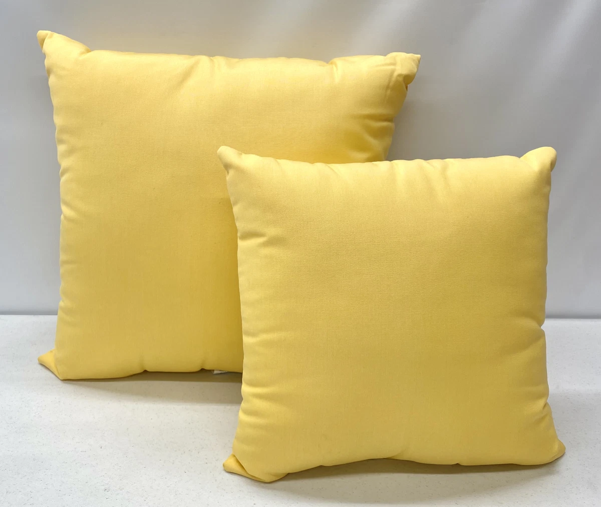 Yellow sunbrella online outdoor pillows