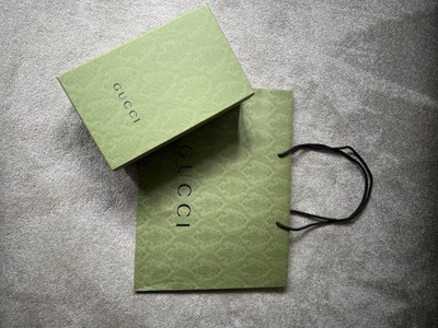 Leerer Gucci Schuhkarton und Tragetasche