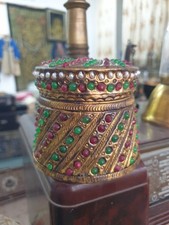 The container or box in which soil from the Kaaba is placed