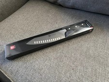 ZWILLING Pro 7-inch Rocking Santoku Knife, Ho...
