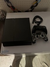 PlayStation 4 Black Power Cord And Two Controllers Included.