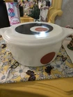 Vintage Pyrex Moon Deco covered casserole dish.