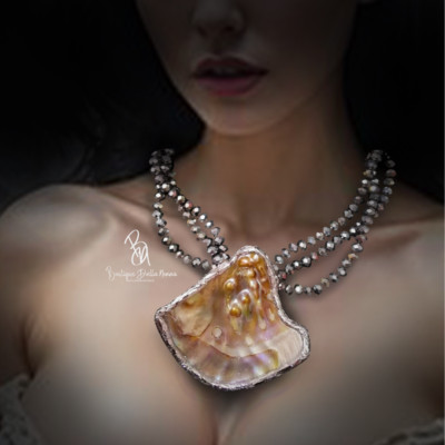 ECCENTRIC SILVER PLATED SEA SHELL NECKLACE