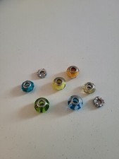 8 Glass And Silver-plated Charms