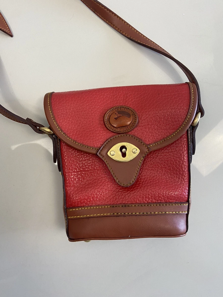 Dooney and bourke strap too long hotsell
