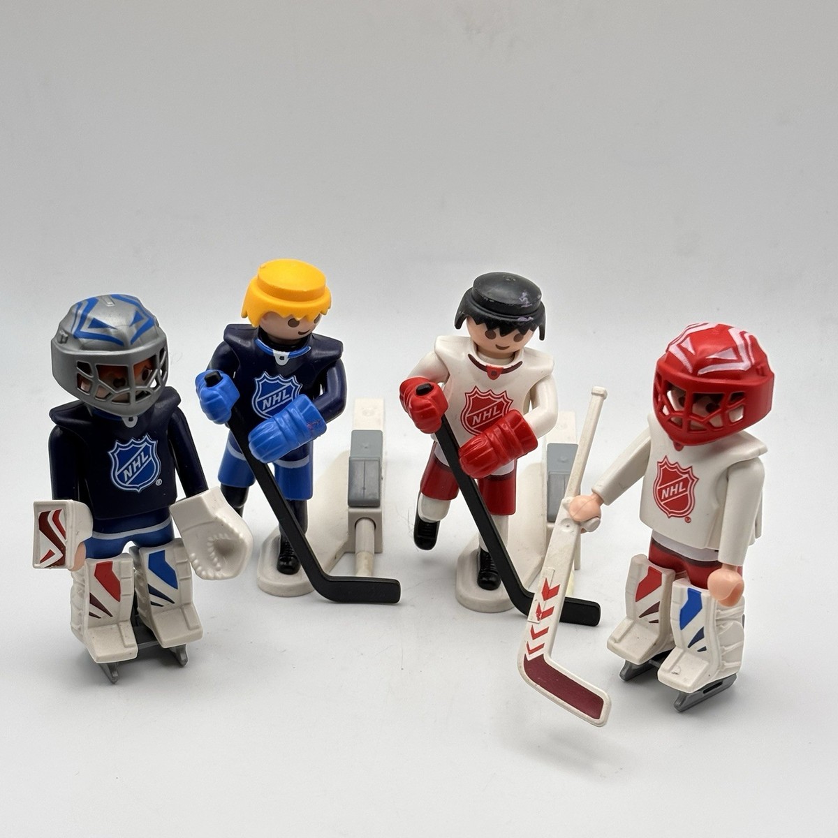 Lot of Playmobil NHL Hockey player figures