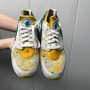 nike air huarache light mens gold