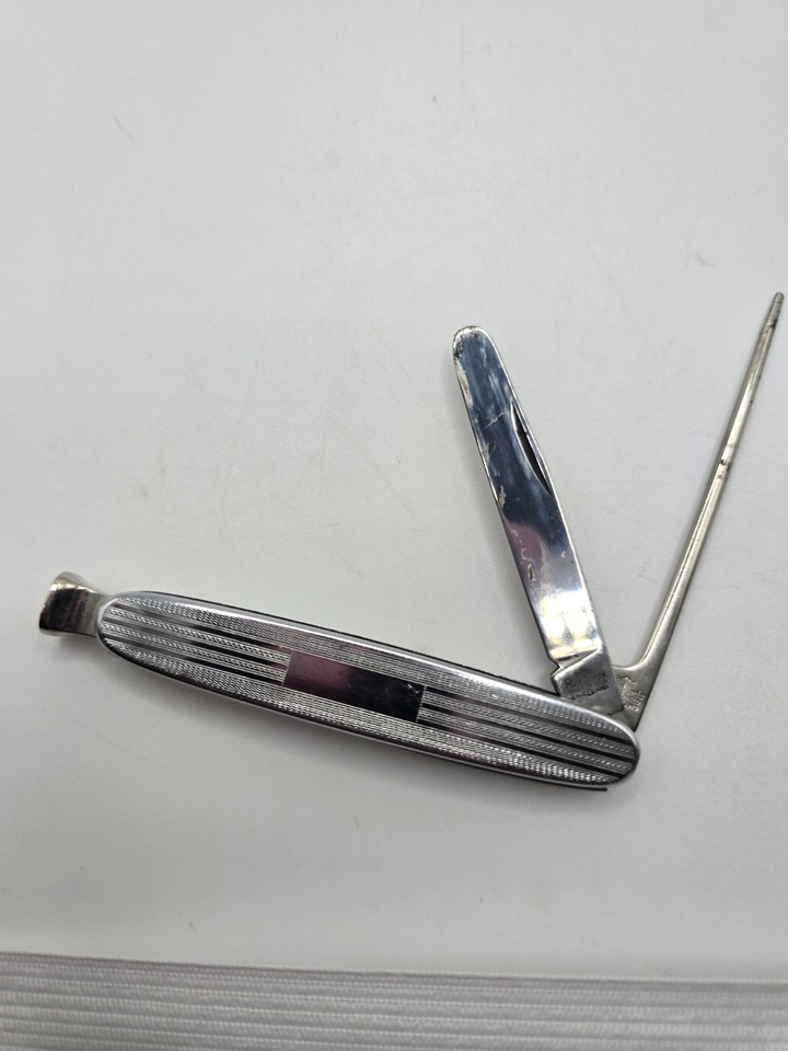 A Richard's Sheffield pipe smoker's pocket tool — a beautifully niche, English-made vintage piece that's part knife, part pipe kit, and entirely charming.